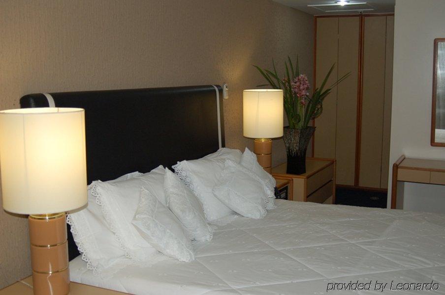Like Ue Hotel Goiânia Værelse billede