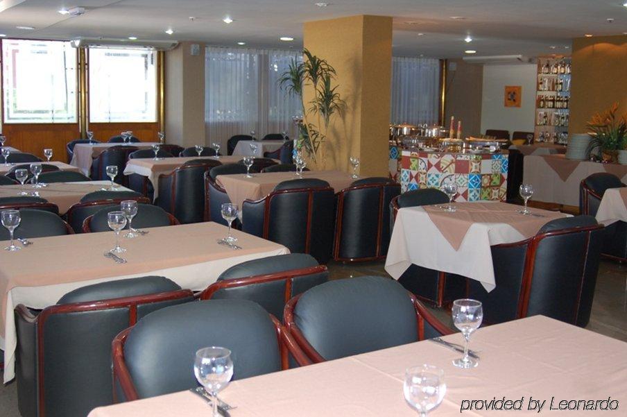 Like Ue Hotel Goiânia Restaurant billede